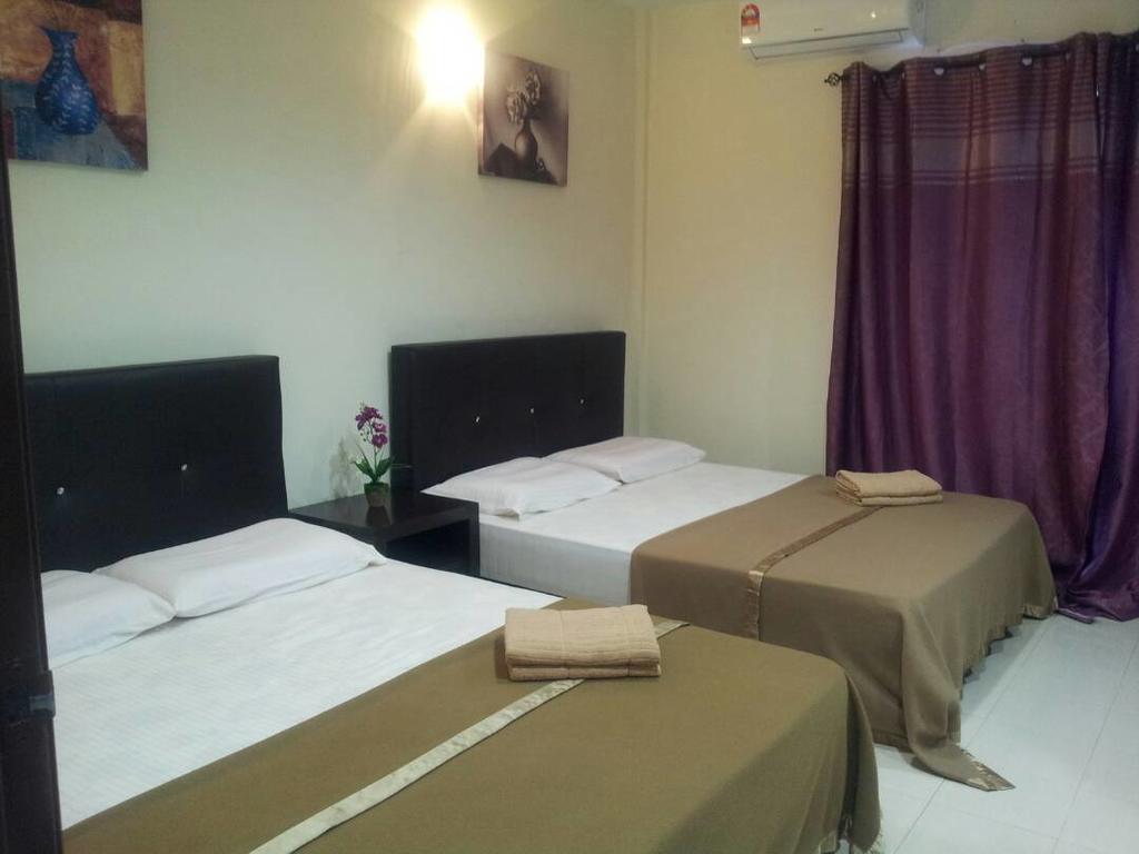 Huda Inn Pantai Cenang  Extérieur photo